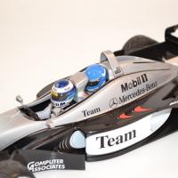 minichamps-mc-laren-mp4-98t-double-siege-mika-et-erja-hakkinen-au-1-18-autominiature01-3.jpg