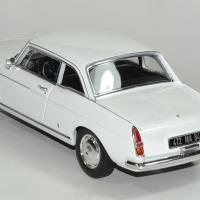 Peugeot404 coupe blanc 1967 norev 1 18 autominiature01 4 