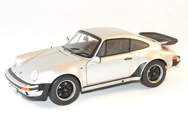 Porsche 911 3 3 argent 1977 norev 1 18 autominiature01 1